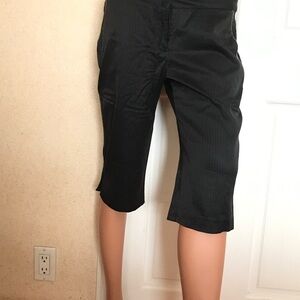 Bebe black & white pinstriped shorts in good condition. Sz 6.